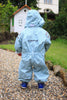 Toddler walking  in Ace Light Blue Rain suit