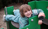 Boy in playground Boy with Original Rainsuit in Manu by Ducksday